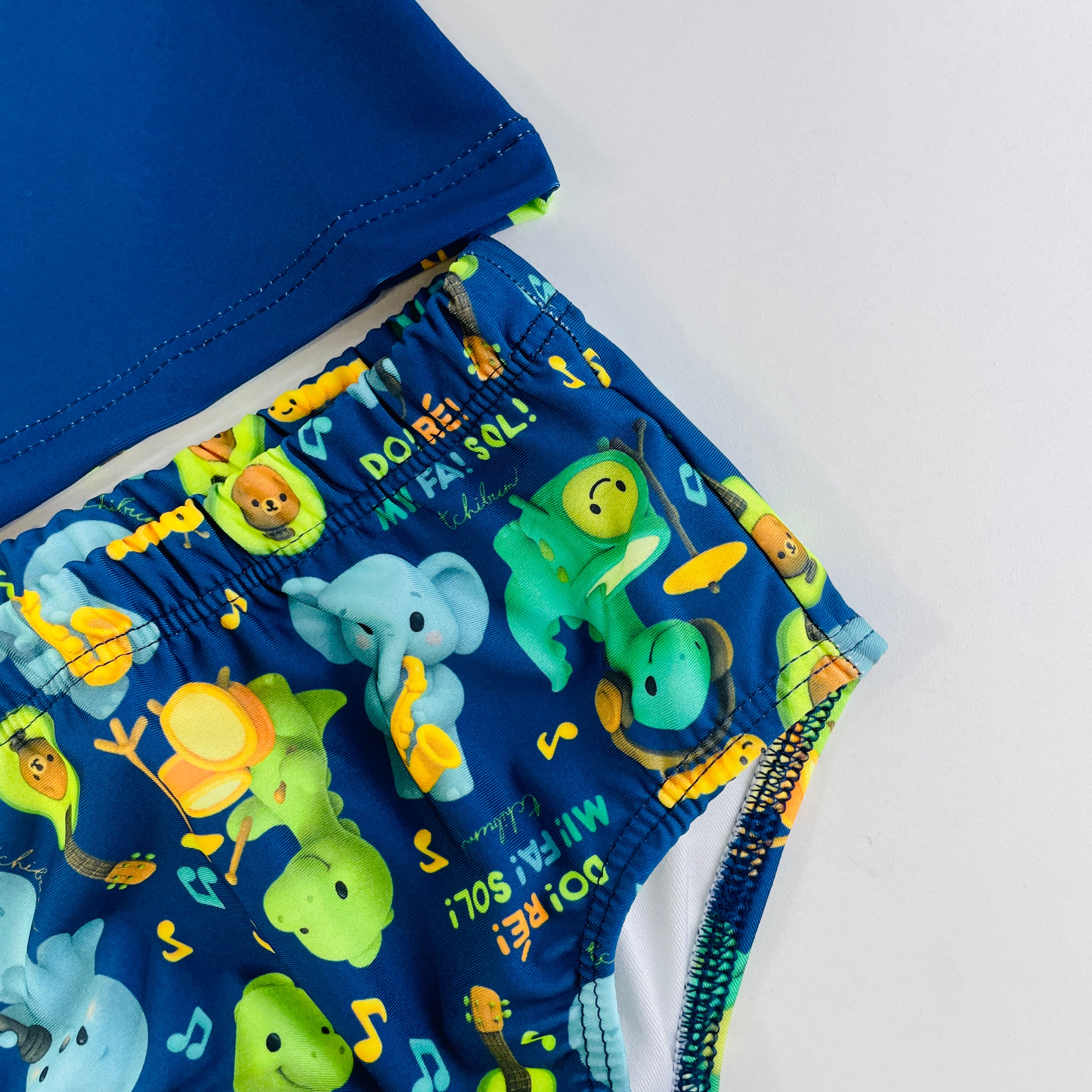 Conjunto Masculino Tchibum Dino Dó Ré Mi Fá Sol UV50+ Dry Fit