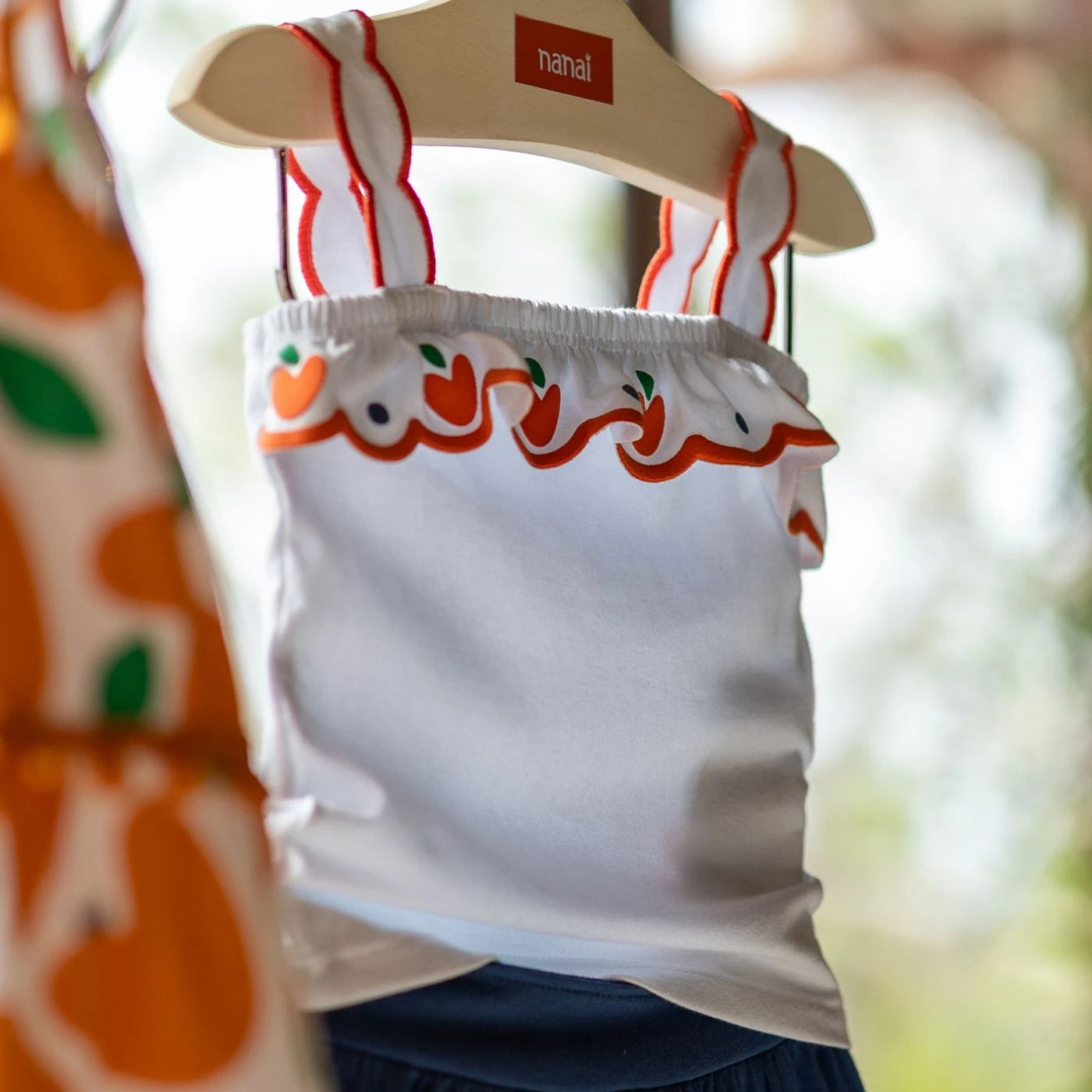 Conjunto Infantil Feminino Nanai Laranjas Cropped e Saia Short