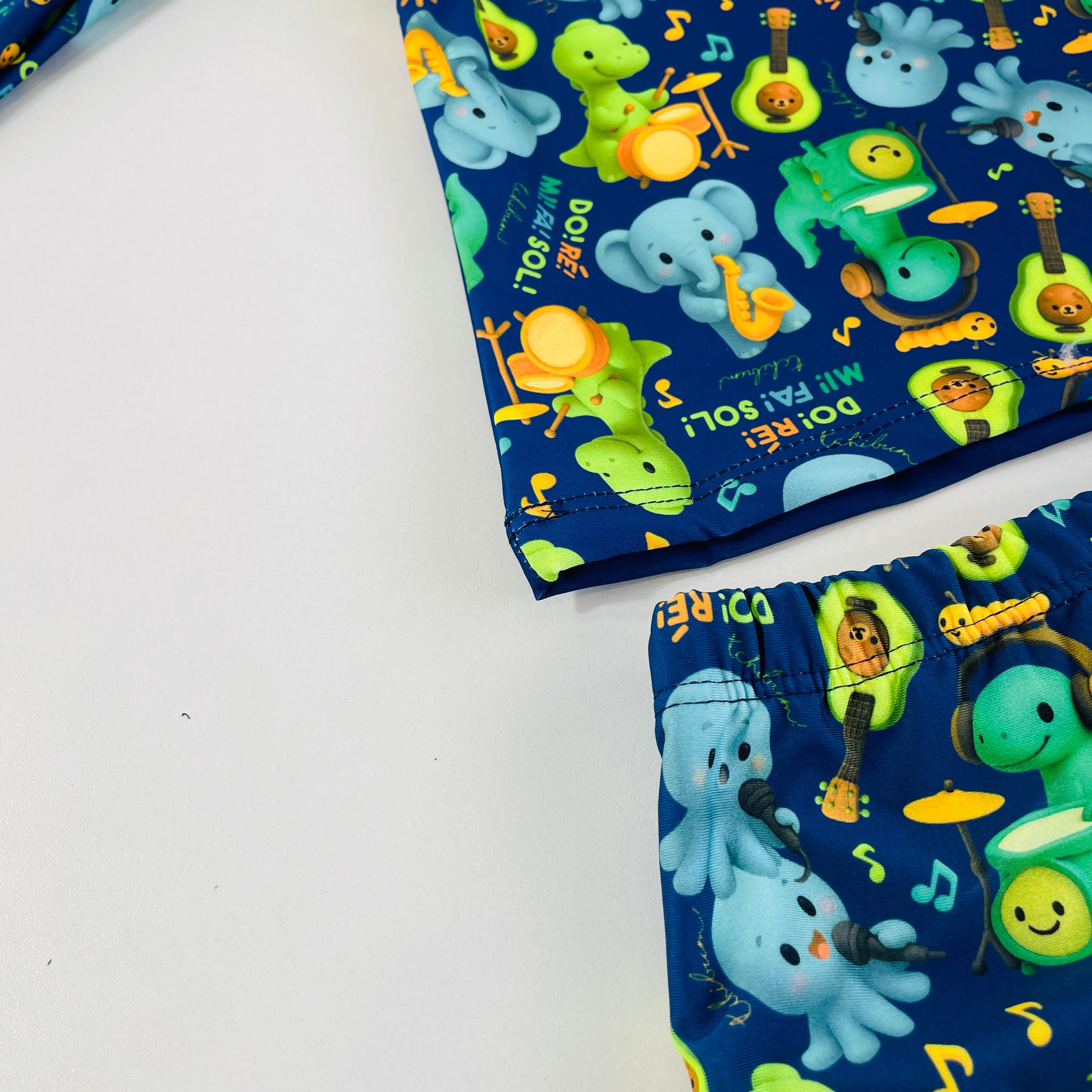 Conjunto Masculino Tchibum Dino Dó Ré Mi Fá Sol UV50+ Dry Fit