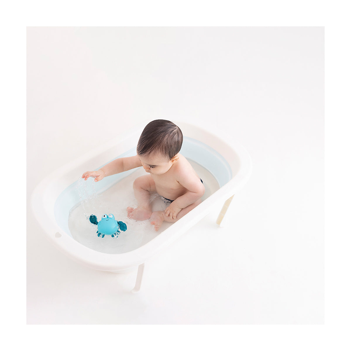 Brinquedo Bebê Pimpolho Banho Caranguejo Dar Corda Interativo